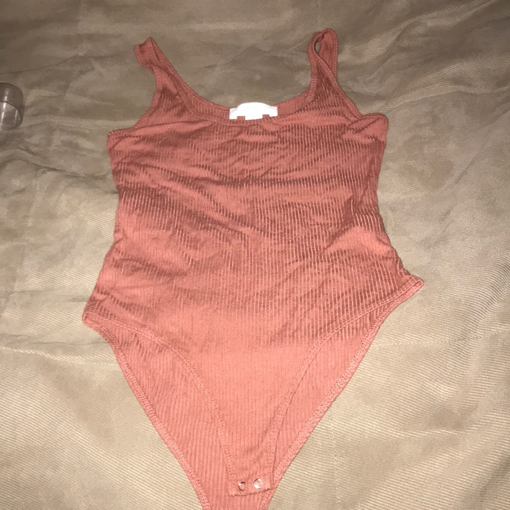 blush pink body suit